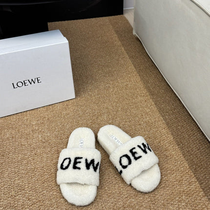 LOEWE 26S FLUFFY SLIDE SANDALS IN WHITE SHEARLING LOGO
