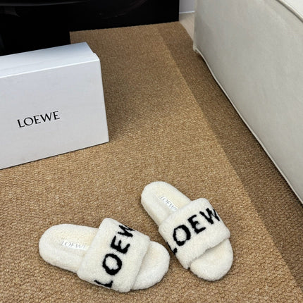 LOEWE 26S FLUFFY SLIDE SANDALS IN WHITE SHEARLING LOGO