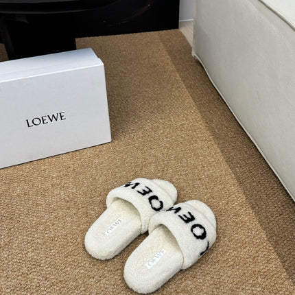 LOEWE 26S FLUFFY SLIDE SANDALS IN WHITE SHEARLING LOGO