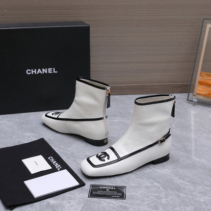 CHANEL 26S ANKLE BOOTS IN WHITE CALFSKIN WITH BLACK PATENT LEATHER TRIM AND CC LOGO ON TOE CAP