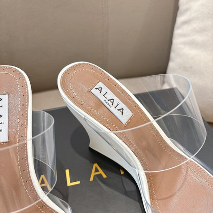 ALAIA 26S HIGH-HEEL WEDGE MULES 95 MM IN WHITE GLOSSY CALFSKIN