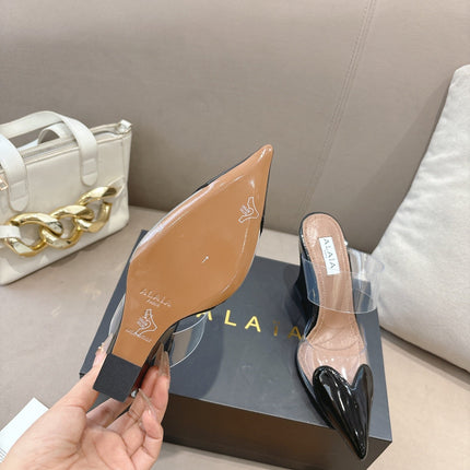 ALAIA 26S HIGH-HEEL WEDGE MULES 95 MM IN BLACK GLOSSY CALFSKIN