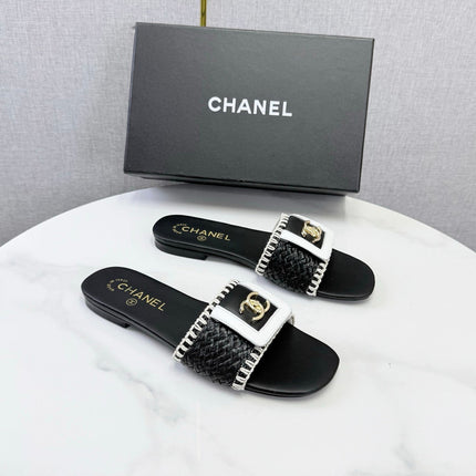 CHANEL 26S WOVEN STRAP SLIDES IN BLACK LAMBSKIN