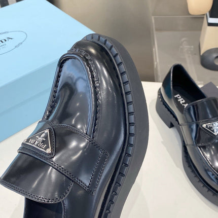 PRADA 26S LOAFERS IN BLACK CALFSKIN WITH LOGO SILVER HARDWARE