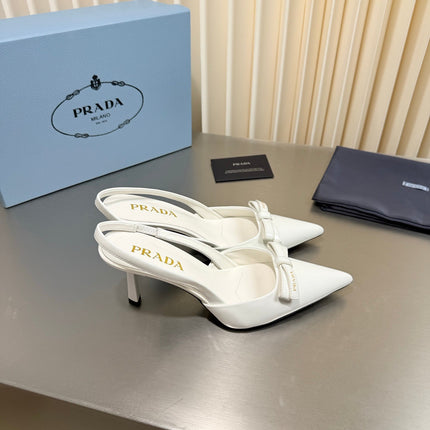 PRADA 26S POINTED-TOE SLINGBACK PUMPS IN WHITE PATENT CALFSKIN WITH BOW