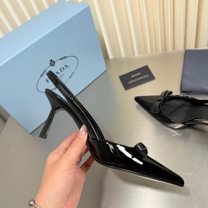 PRADA 26S POINTED-TOE SLINGBACK PUMPS IN BLACK PATENT CALFSKIN WITH BOW