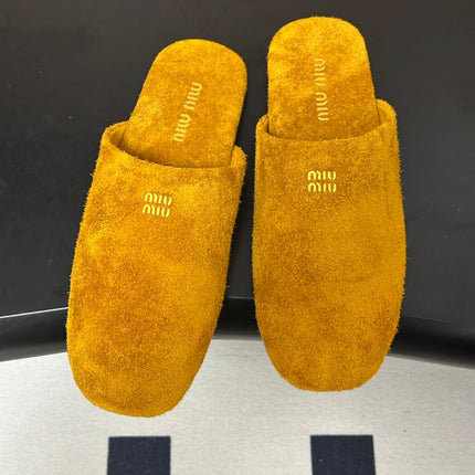 MIUMIU 26S MULE LOAFERS IN OCHRE YELLOW SUEDE LOGO