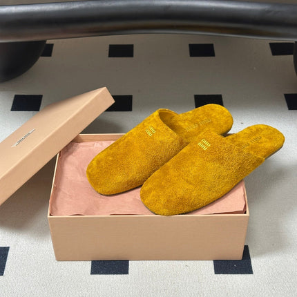 MIUMIU 26S MULE LOAFERS IN OCHRE YELLOW SUEDE LOGO