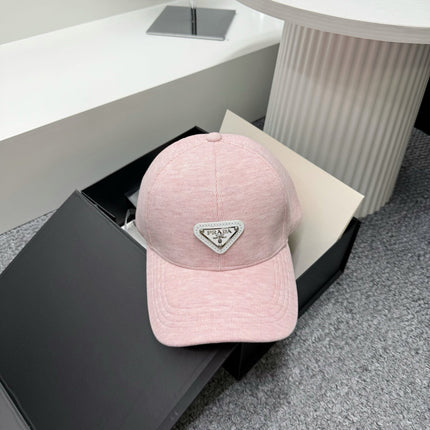PRADA 26S BASEBALL CAP IN LIGHT PINK 558604