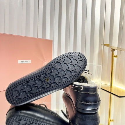 MIUMIU 26S FUR BOAT SHOES IN BLACK CALFSKIN