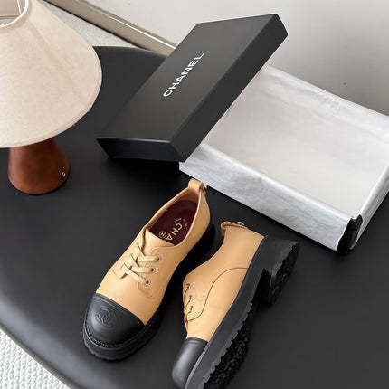 CHANEL 26S LACE UP PLATFORM IN BLACK AND BEIGE CALFSKIN