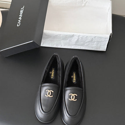 CHANEL 26S LOAFERS IN BLACK CALFSKIN AND SHEARLING LINING