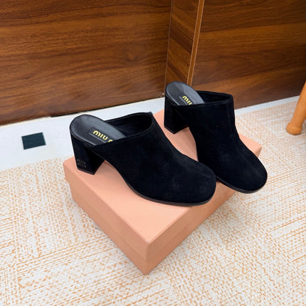 MIUMIU 26S BLOCK HEEL MULES IN BLACK SUEDE