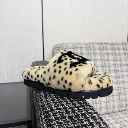 CHANEL 26S PLATFORM SLIDE SANDALS IN BEIGE AND BLACK SHEARLING DALMATIAN PRINT
