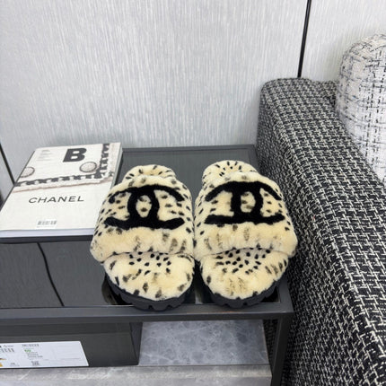 CHANEL 26S PLATFORM SLIDE SANDALS IN BEIGE AND BLACK SHEARLING DALMATIAN PRINT