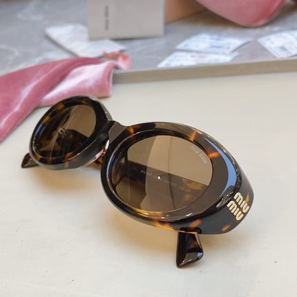 MIUMIU 26S OVAL FRAME IN ACETATE 415247
