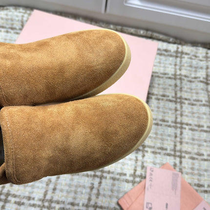 MIUMIU 26S SLIP-ON BOOTIES IN CAMEL BROWN SUEDE WITH SHEARLING