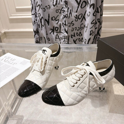 CHANEL 26S HIGH HEEL ANKLE BOOTS 70 MM IN WHITE LAMBSKIN AND BLACK PATENT CALFSKIN