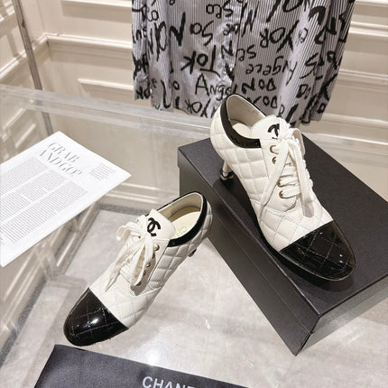 CHANEL 26S HIGH HEEL ANKLE BOOTS 70 MM IN WHITE LAMBSKIN AND BLACK PATENT CALFSKIN