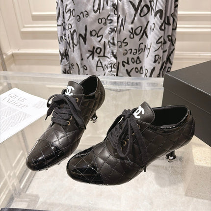 CHANEL 26S HIGH HEEL ANKLE BOOTS 70 MM IN BLACK LAMBSKIN AND PATENT CALFSKIN