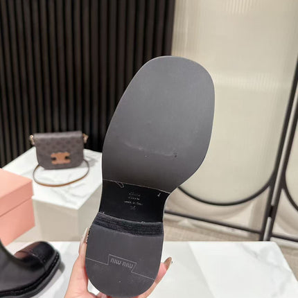 MIUMIU 26S HIGH-ANKLE BOOTS 50MM IN BLACK GLOSSY CALFSKIN