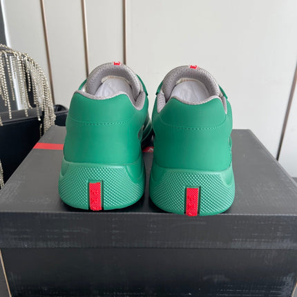 PRADA 26S AMERICA CUP SNEAKERS IN TEAL GREEN SOFT RUBBER AND BIKE FABRIC