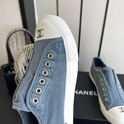 CHANEL 26S LOW TOP SNEAKERS IN NAVY BLUE CANVAS