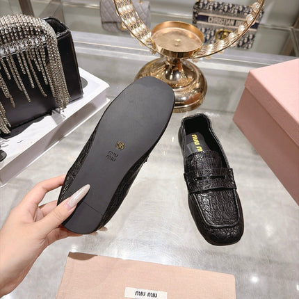 MIUMIU 26S ENNY LOAFERS IN BLACK CROCODILE EMBOSSED CALFSKIN
