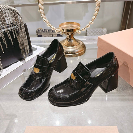MIUMIU 26S HEEL LOAFERS 75MM IN BLACK PATENT CALFSKIN GOLD HARDWARE