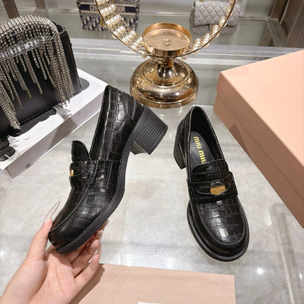 MIUMIU 26S BLOCK HEEL LOAFERS 55MM IN BLACK CROCODILE EMBOSSED CALFSKIN GOLD HARDWARE