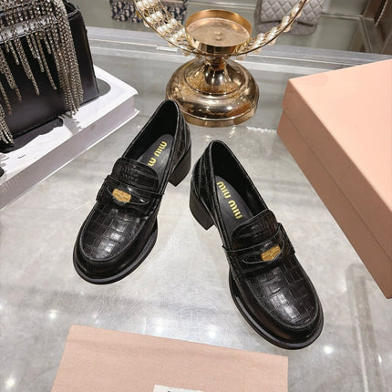 MIUMIU 26S BLOCK HEEL LOAFERS 55MM IN BLACK CROCODILE EMBOSSED CALFSKIN GOLD HARDWARE