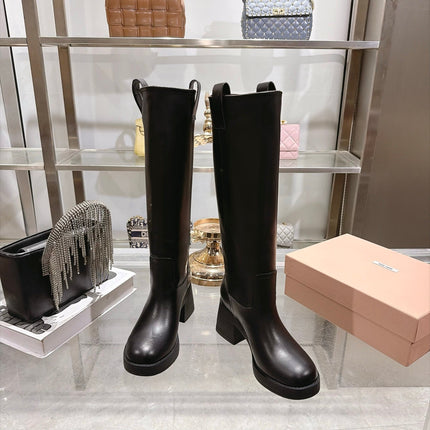 MIUMIU 26S KNEE HIGH BLOCK HEEL BOOTS 50MM IN BLACK CALFSKIN