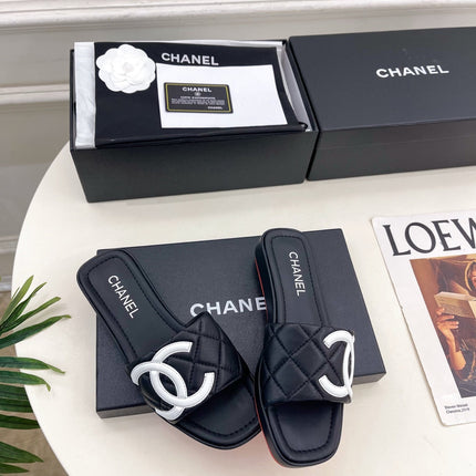 CHANEL 26S FLAT SLIDES IN BLACK LAMBSKIN WITH WHITE CC LOGO