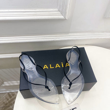 ALAIA 26S POINTED-TOE THONG SANDALS IN BLACK SATIN AND TRANSPARENT PVC
