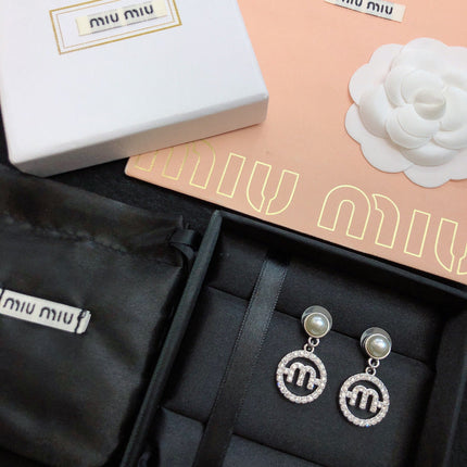 MIUMIU 26S PEARL DROP CRYSTAL LOGO CIRCLE EARRINGS IN SILVER TONE METAL 615772